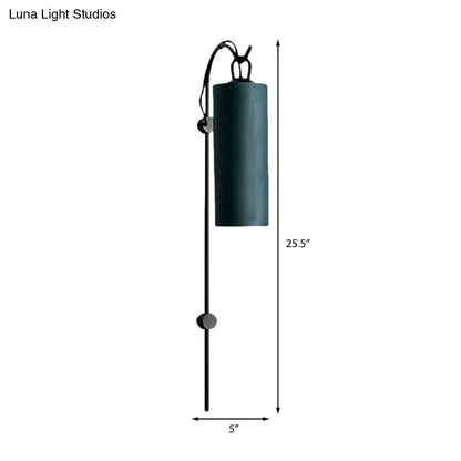 Modern dark teal cylindrical wall sconce with black metal frame and bunny top, direct wired electric 220v-240v suitable for living room