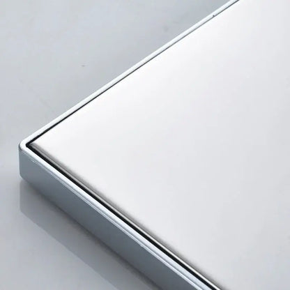 A sleek white shower tray with bright chrome led frame and integrated drainage for decorbites bright chrome shower head