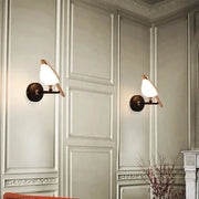 Pair of modern bronze bird wall lights with warm-toned glass shades perfect for living room decorbites bird wall light