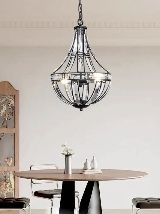 A sleek black chrome gold globe led chandelier with clear glass panels and chain suspension for modern living room decorbites bronze black