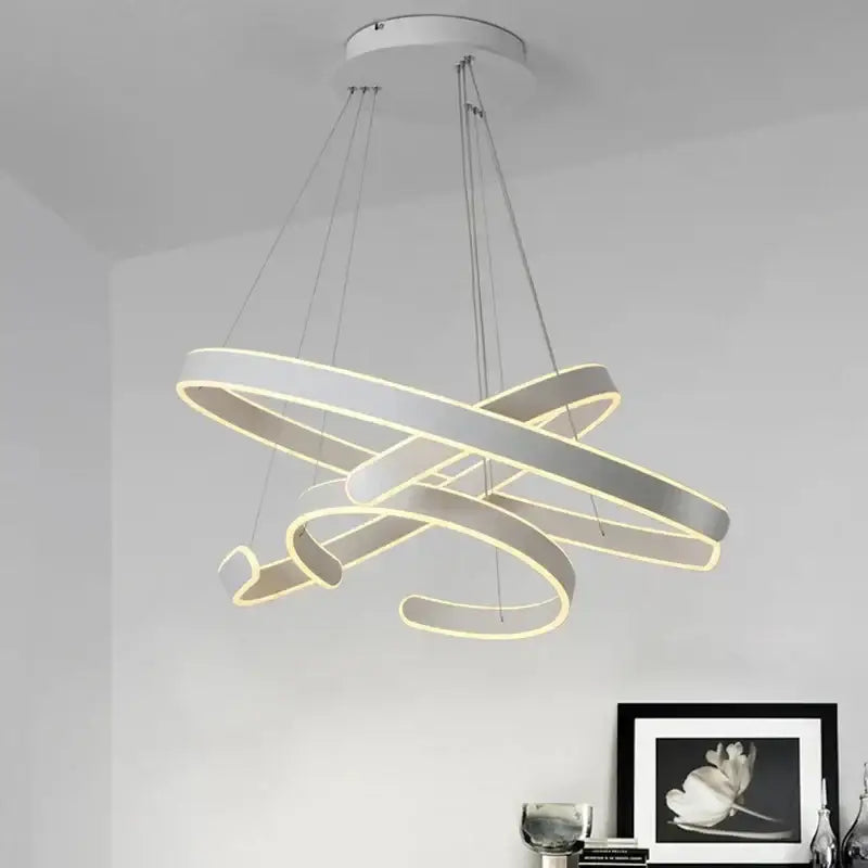 Modern bronze circle rings acrylic pendant light featuring white led chandelier with interlocking circle rings and warm glow