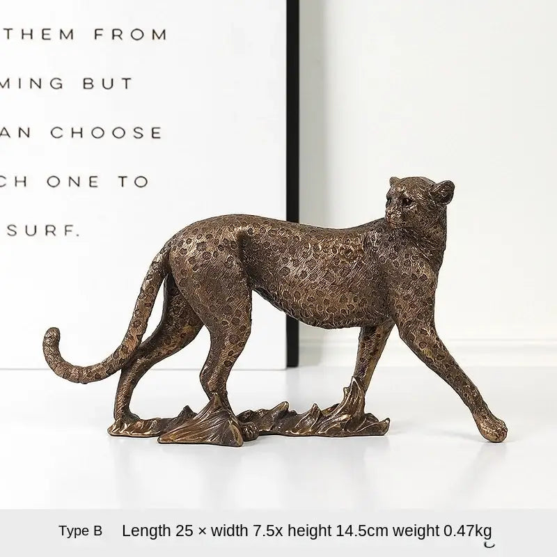 Modern bronze leopard statue with detailed spotted pattern and stylized rocky base by decorbites leopard statue for decor