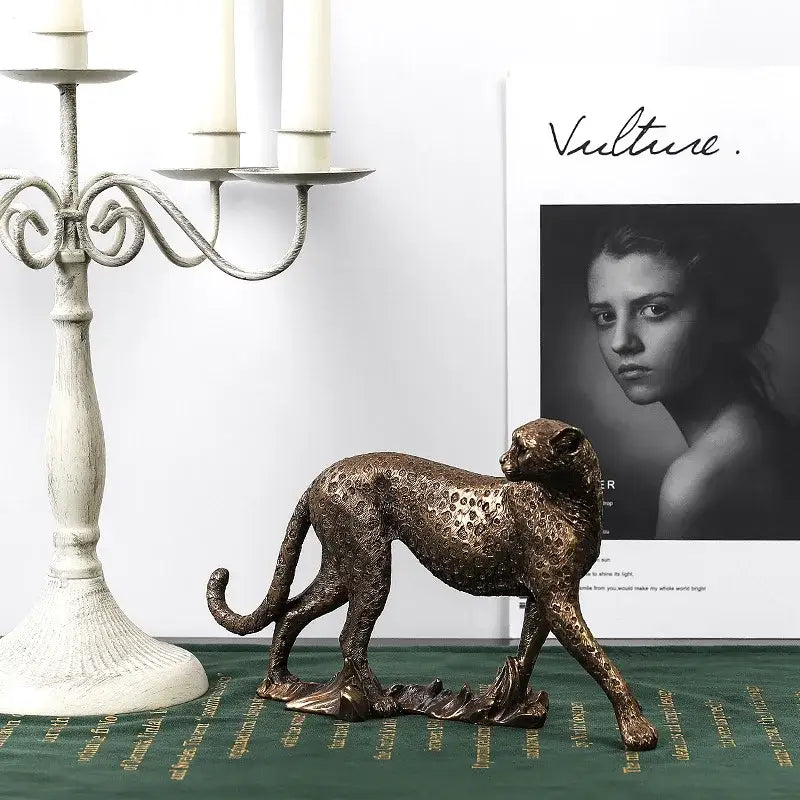 Modern bronze leopard statue featuring detailed spotted pattern and textured surface for living room decorbites leopard statue