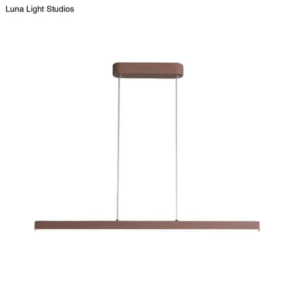 Modern rectangular metal pendant lamp in matte copper finish by DecorBites with warm white light and minimalist design