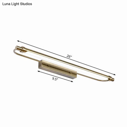 A sleek 26-inch brass-finished modern tubed vanity light with integrated LED warm white lighting for bathroom use