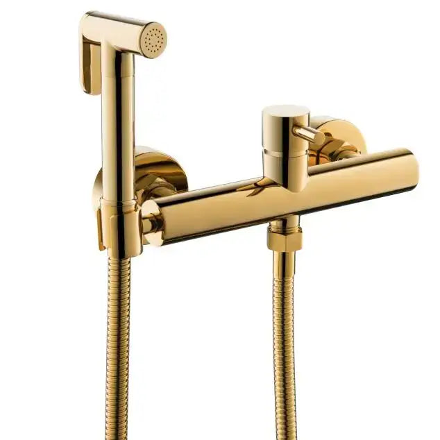 Modern brushed brass hand held bidet sprayer kit with gold-finished brass faucet and textured hose for bathroom use