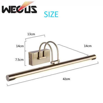 Modern brushed bronze led vanity light with a bronze-finished sleek cylindrical design and curved mounting bracket decorbites brushed bronze