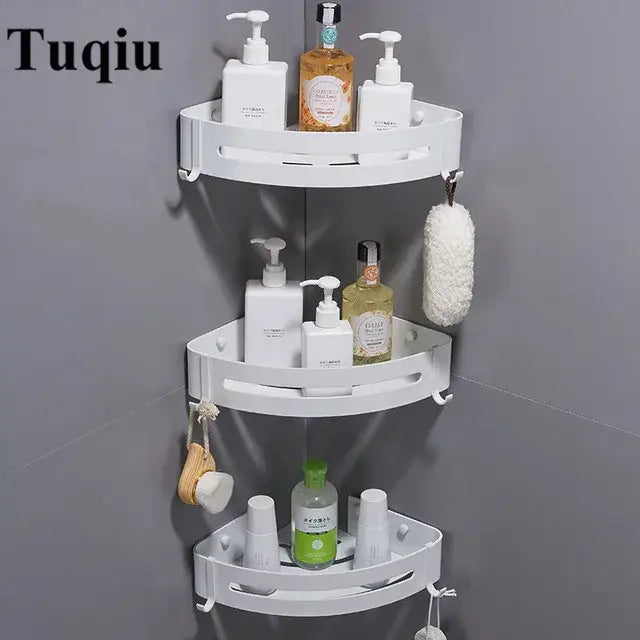White plastic three-tier corner shelf with hooks and cutout handles for bathroom use by decorbites brushed gold aluminum