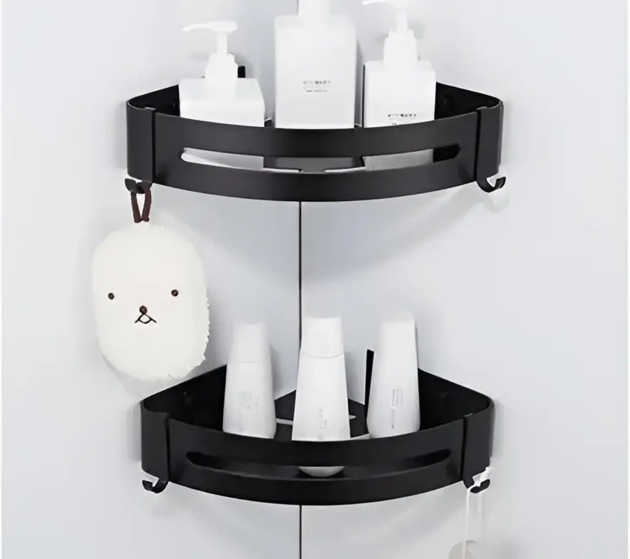 Black two-tier corner shelf with sleek modern design and rounded edges in decorbites brushed gold aluminum finish