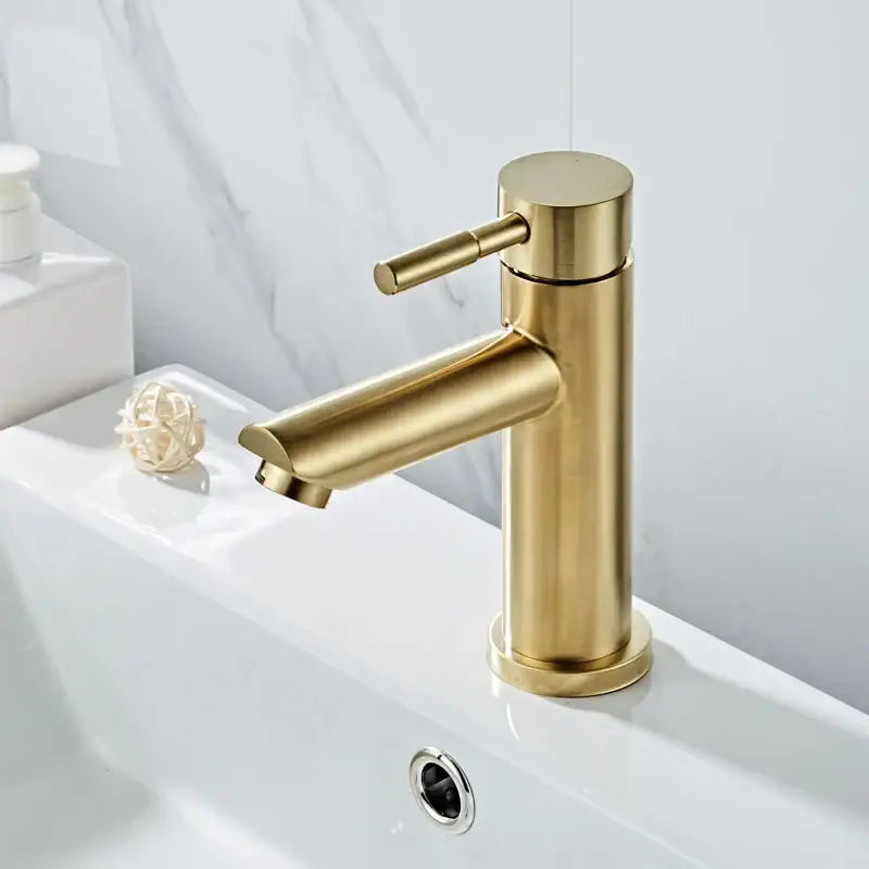 Modern brushed gold basin faucet with single handle mixer tap featuring sleek brushed metal finish decorbites brushed gold