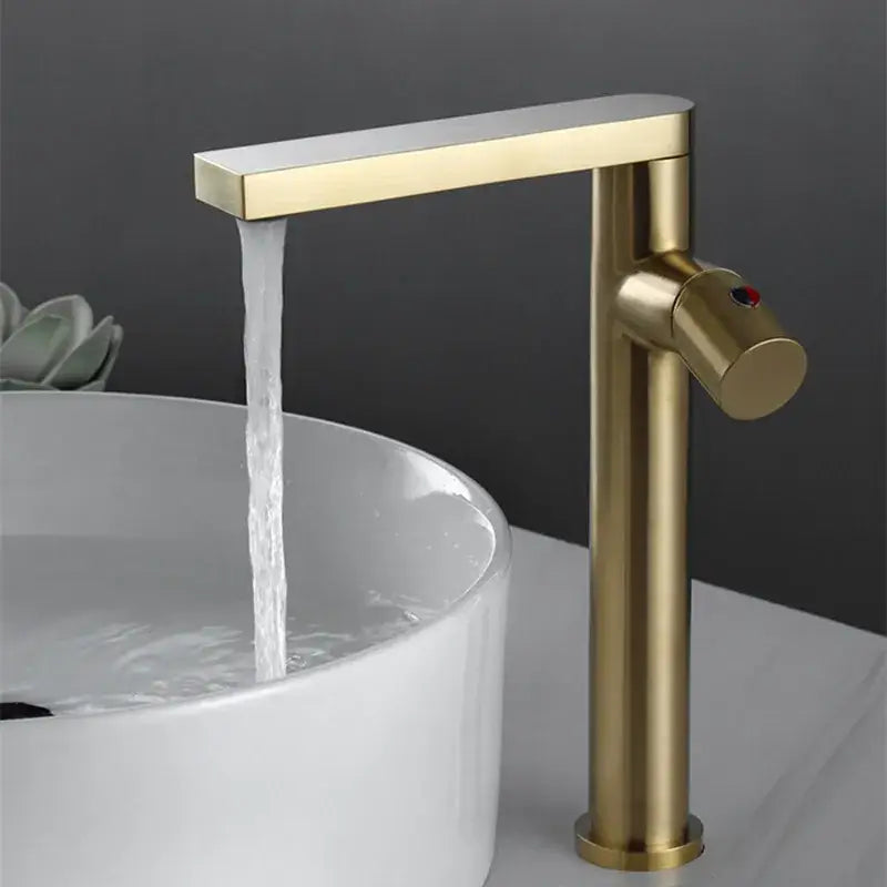 Modern brushed gold basin faucet with sleek rectangular spout and cylindrical body decorbites brushed gold design