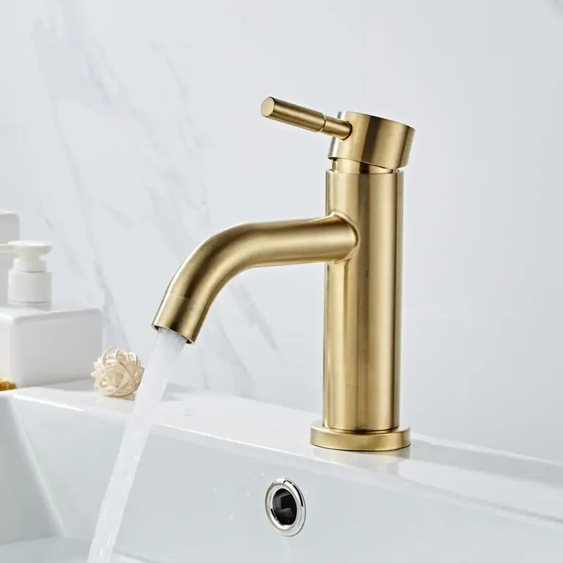 Modern brushed gold basin faucet with single handle mixer featuring a sleek brushed gold finish by decorbites