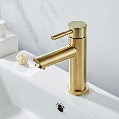 Modern brushed gold basin faucet with single handle mixer in brushed metal finish by decorbites for bathroom use
