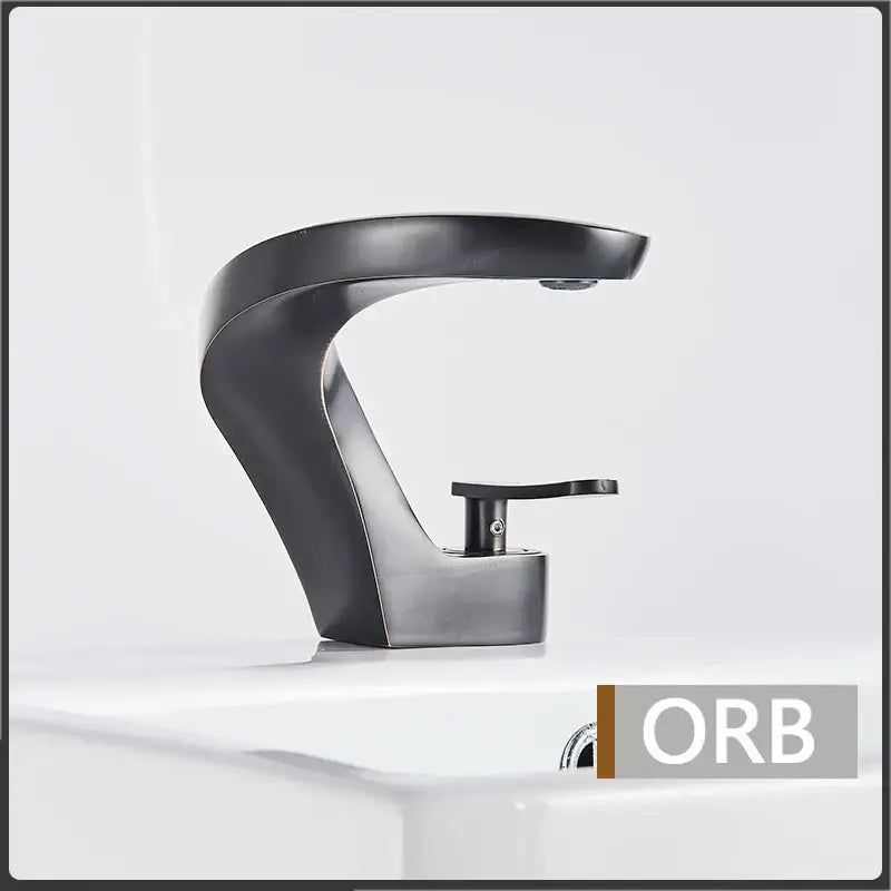 Modern matte black basin faucet with sleek curved design and single lever handle for decorbites brushed gold mixer tap
