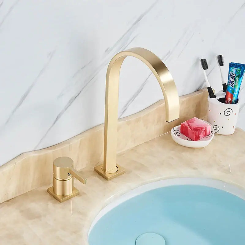 Modern brushed gold basin faucet with sleek curved spout and square base by decorbites brushed gold for bathroom sink mixer tap