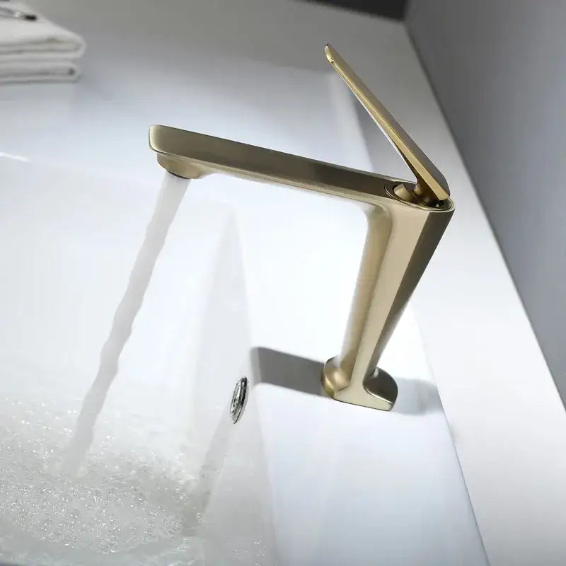 Modern brushed gold basin faucet with sleek angular design and matte finish for bathroom sink decorbites brushed gold