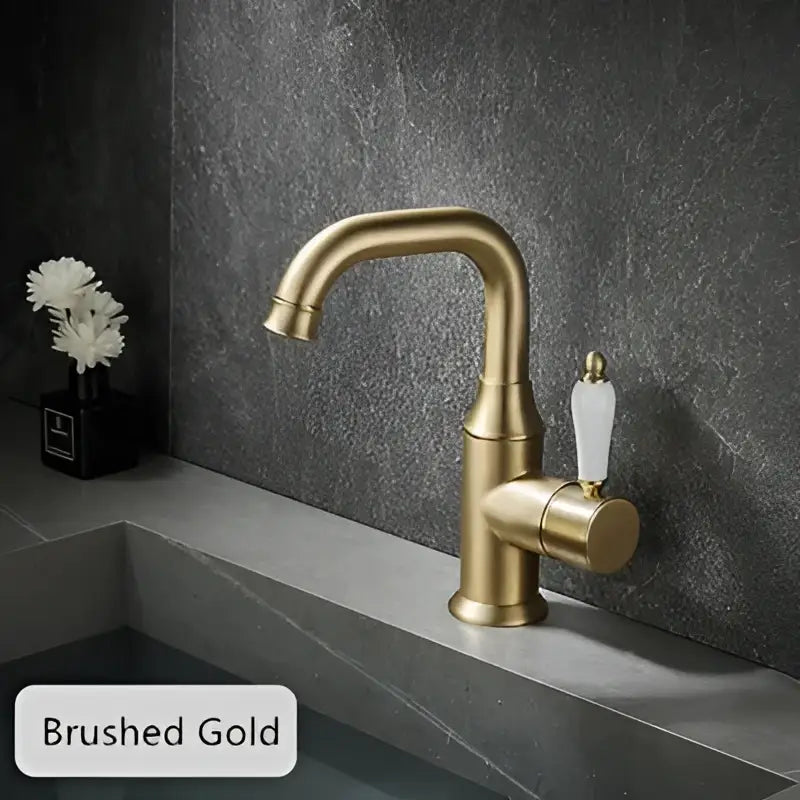 Modern brushed gold basin faucet with white ceramic handle from decorbites for bathroom sink use
