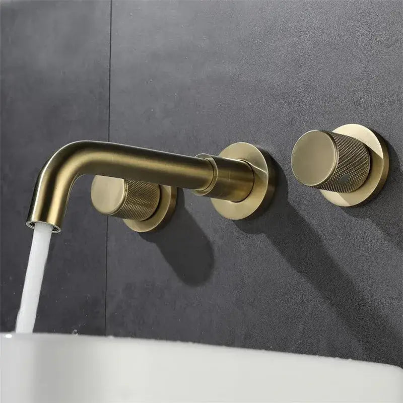Modern brushed gold basin faucet wall mount with brass finish textured circular knobs and curved spout decorbites brushed gold