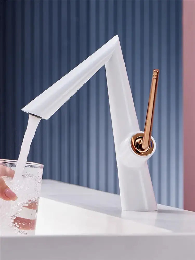 Modern brushed gold basin faucet with white body and rose gold handle designed for contemporary kitchen use decorbites brushed gold