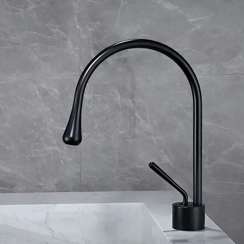 Modern brushed gold basin faucet with black matte finish sleek curved spout decorbites brushed gold design