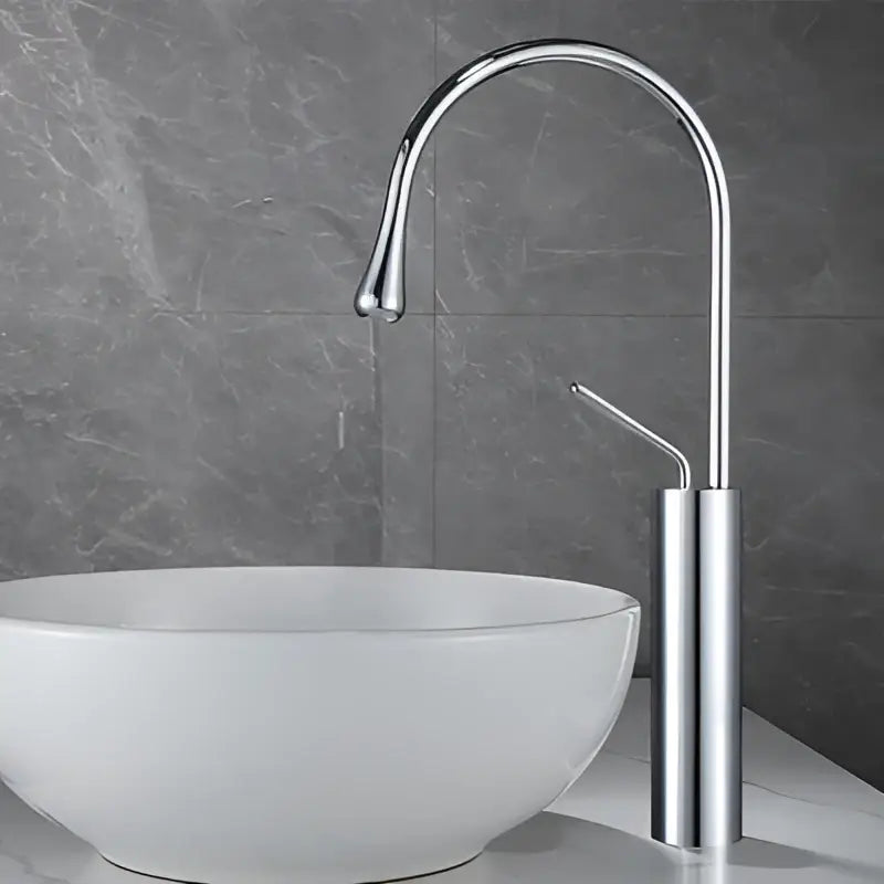 Modern chrome-finished basin faucet with sleek curved spout and minimalist design for decorbites brushed gold kitchen use