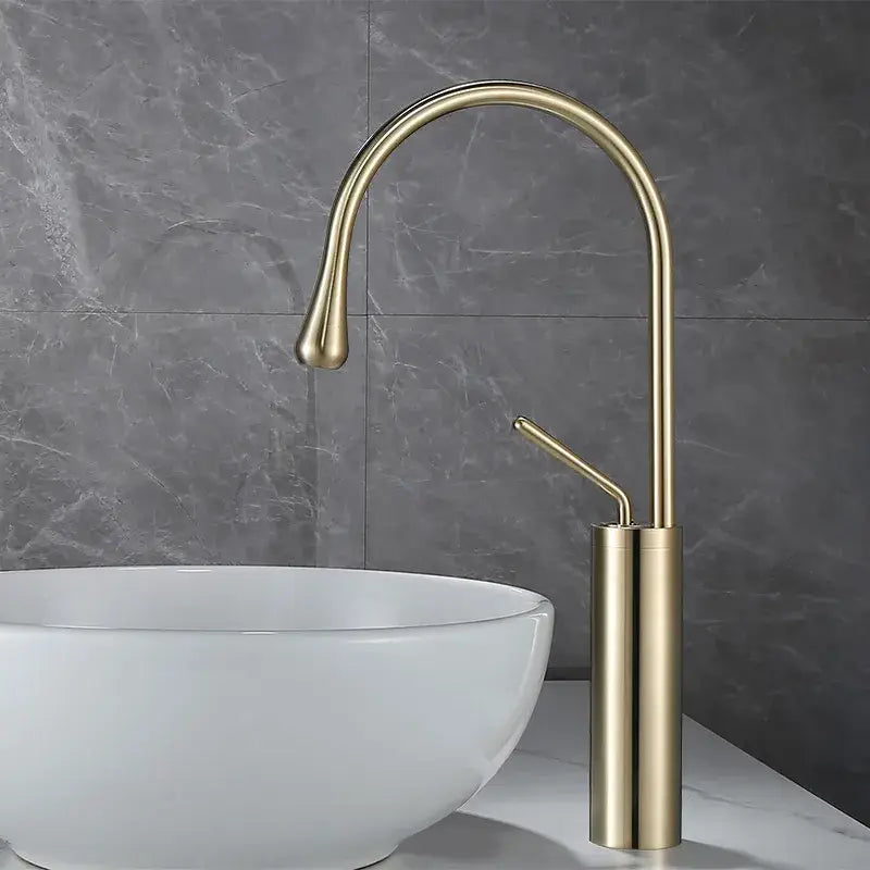 Modern brushed gold basin faucet with curved spout and cylindrical base suitable for kitchen use decorbites brushed gold