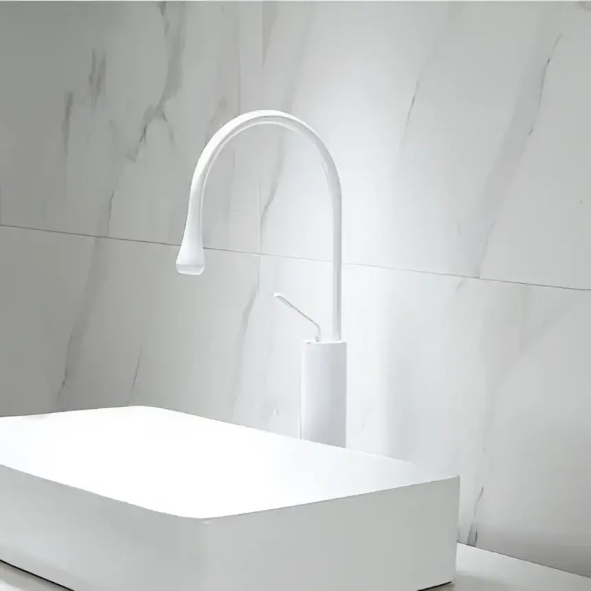 White ceramic basin faucet with sleek curved spout and minimalist design for modern decorbites brushed gold decor