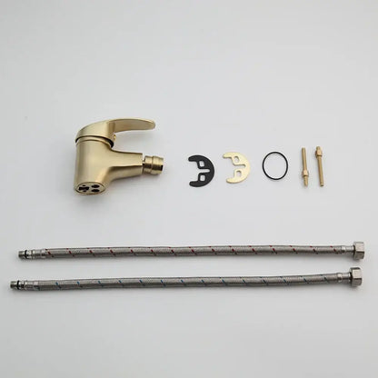 Modern brushed gold basin mixer tap with sleek three-hole spout and spray head in a brushed gold finish