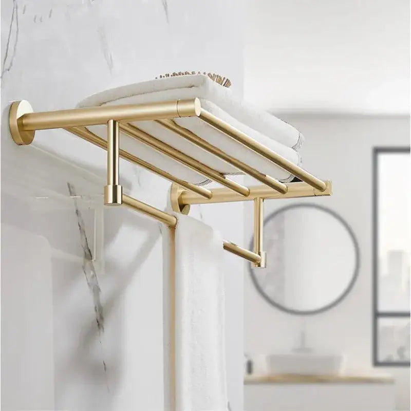 Modern brushed gold bathroom hardware set with multi bar towel rack in gold-toned metal for stylish bathroom hardware