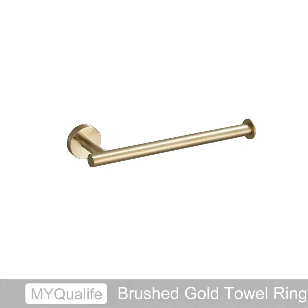 Brushed gold towel ring with sleek cylindrical design and circular mounting plate in decorbites brushed gold hardware set