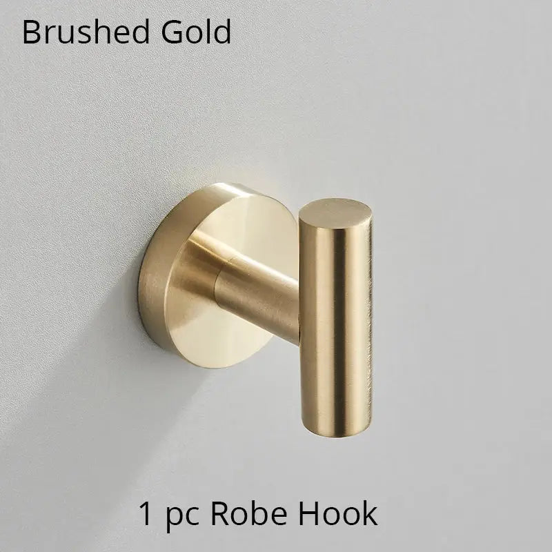 Brushed gold robe hook with sleek cylindrical design and circular base from decorbites bathroom hardware set