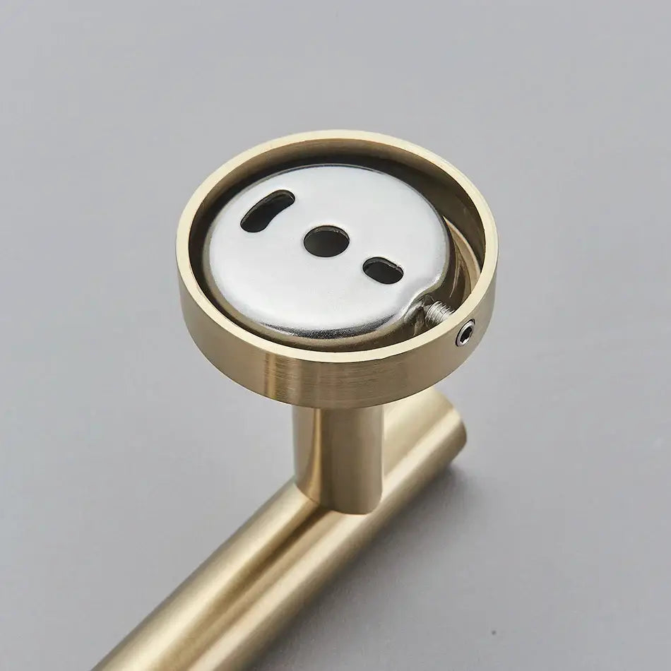 Modern brushed gold bathroom hardware set doorstop with circular base black cutouts and silver inner plate decorbites bathroom hardware