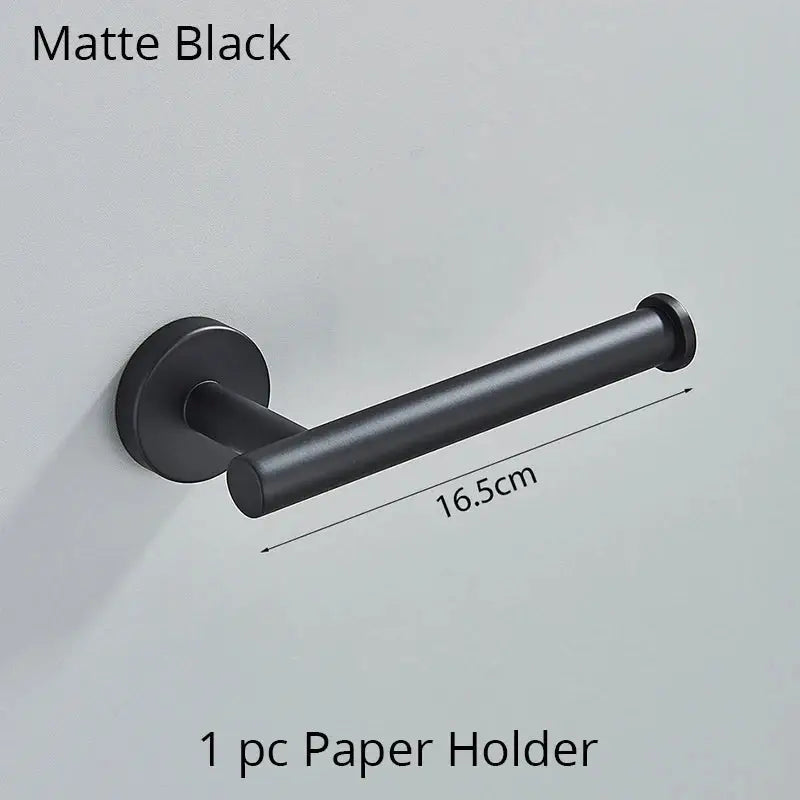 Matte black metal toilet paper holder with cylindrical design in decorbites bathroom hardware set for modern bathroom decor