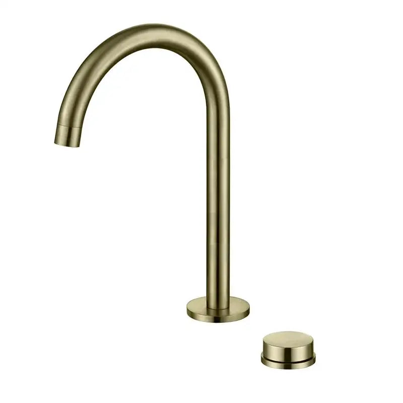 Modern brushed gold basin faucet with brass finish, single-handle design, and sleek curved spout by decorbites