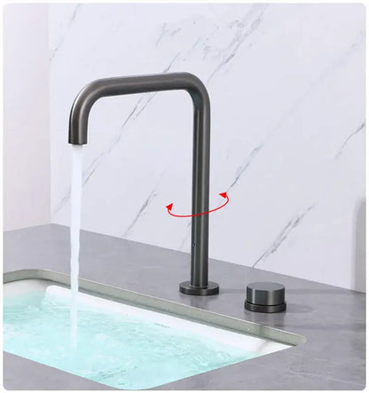 Modern brushed gold and black basin faucet with sleek matte black curved spout and cylindrical handle decorbites brushed gold