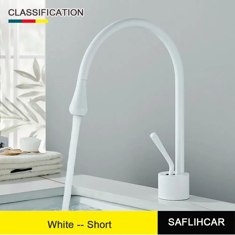 Modern brushed gold and black deck mounted kitchen basin tap with white short single hole curved spout