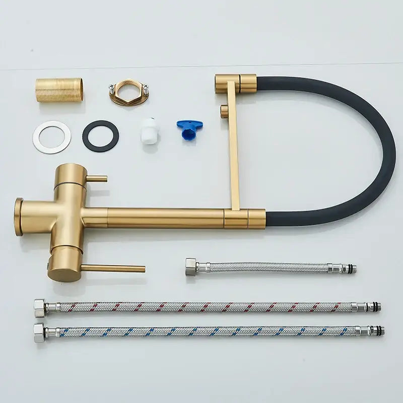 Modern brushed gold dual handle kitchen faucet with sleek black flexible hose by decorbites in minimalist design