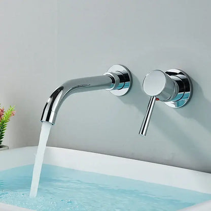 Chrome-finished wall mounted basin faucet with sleek curved spout and cylindrical handle for modern bathroom use