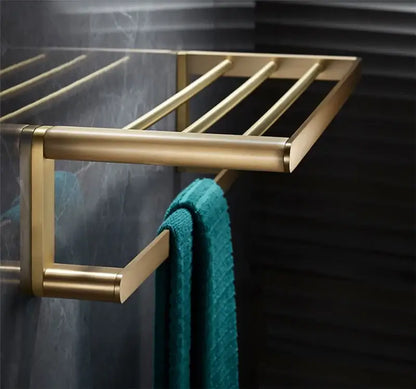 Modern brushed gold brass bath hardware set towel rack with gold-toned metal and sleek horizontal bars