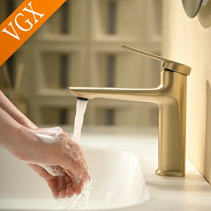 Modern brushed gold basin faucet with sleek minimalist centerset deck-mounted design for cold water use
