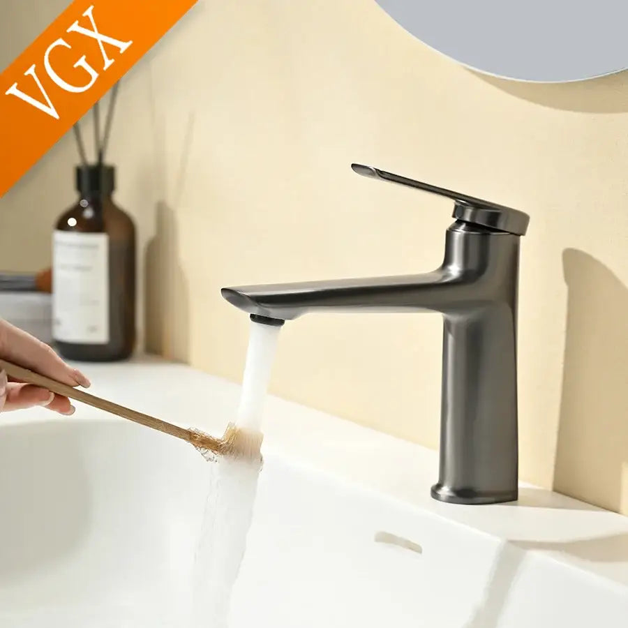Modern matte black basin faucet with sleek minimalist centerset deck-mounted design for cold water use