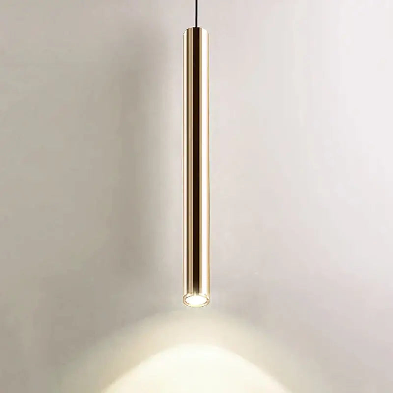 Modern brushed gold led pendant light with a sleek cylindrical design and illuminated base for dining room decorbites gold led