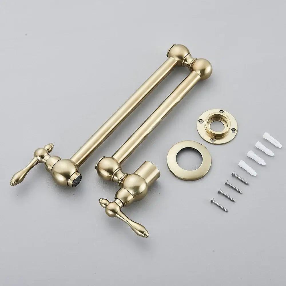 Modern brass-finished pot filler faucet with ornate spherical handles and gooseneck folding spout for kitchen use