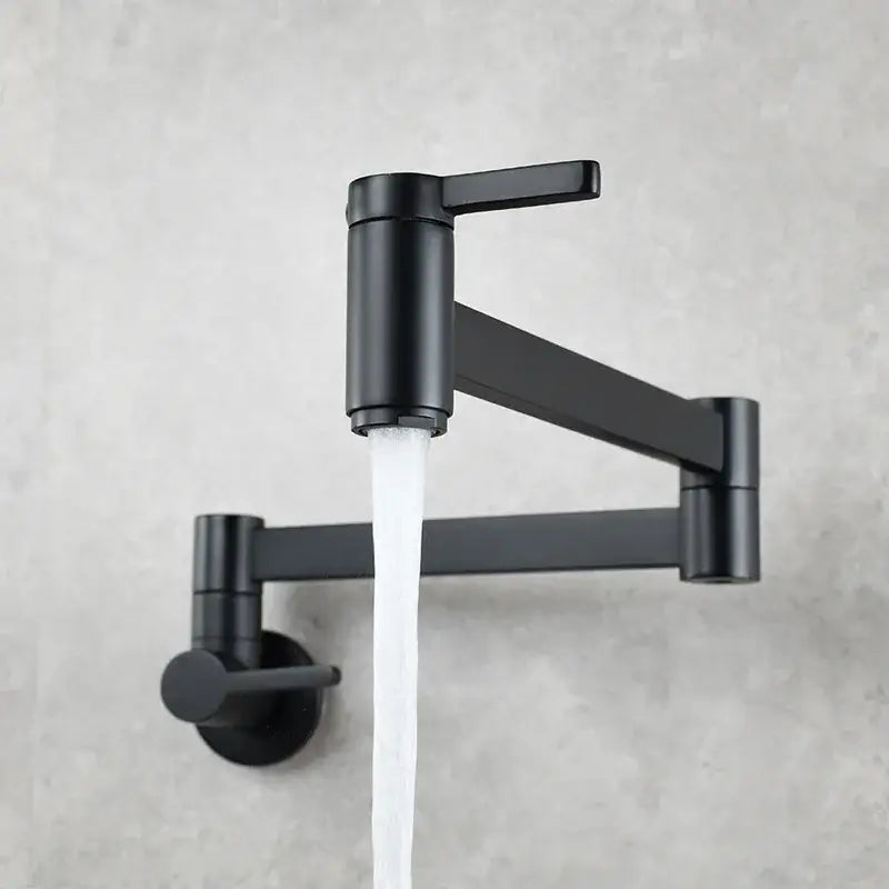 Black matte finish wall-mounted pot filler faucet with sleek articulated arm and dual handles for kitchen use
