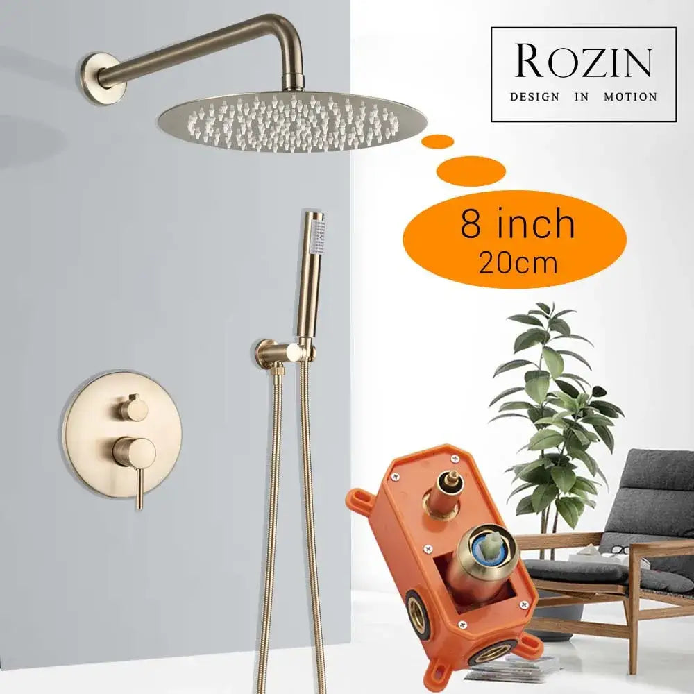 Bronze-finished rozin 8-inch round rainfall shower set with handheld sprayer and wall-mounted valve in brushed gold