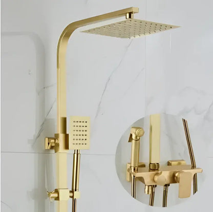 Modern brushed gold shower faucet set with a gold-colored square rainfall head and matching shower arm and rail system