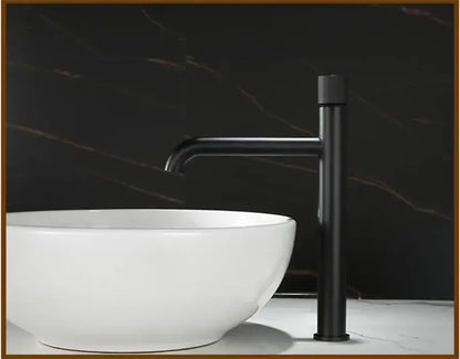 Black matte basin faucet with sleek minimalist design for modern bathroom featuring single handle control