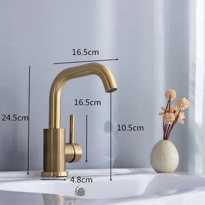 Modern brushed gold basin faucet with single handle, curved spout, and brass-finished cylindrical base for bathroom use