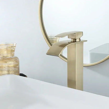 Modern brushed gold basin faucet with waterfall spout and sleek angular design in decorbites brushed gold finish