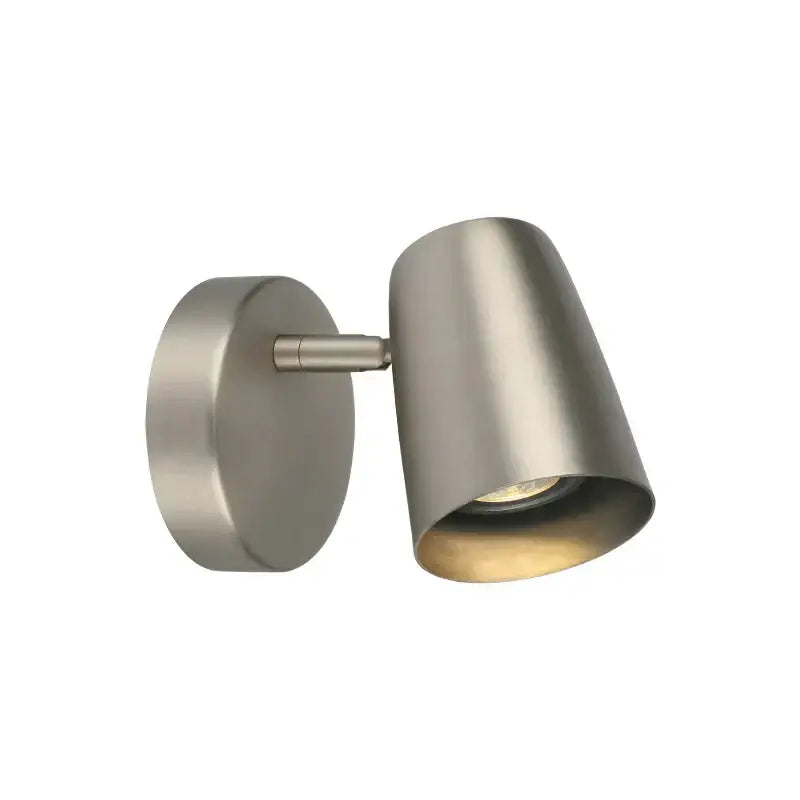 Modern brushed nickel led wall lamp with adjustable conical shade and warm-toned bulb for bedroom lighting